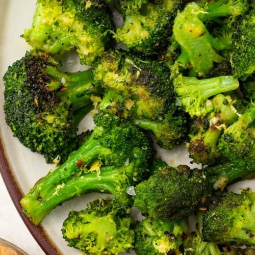 Sauteed broccoli on a white plate