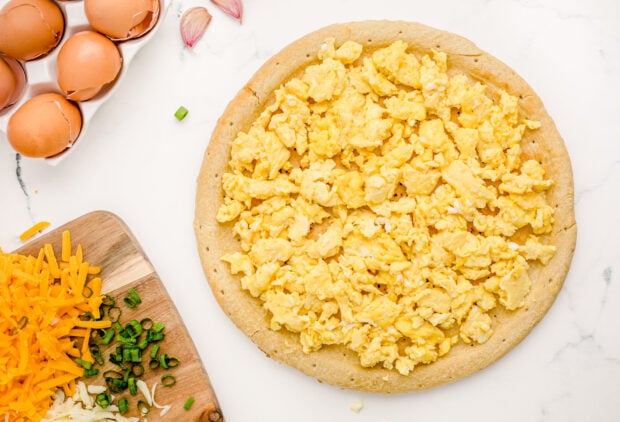 Scrambled eggs on pizza crust