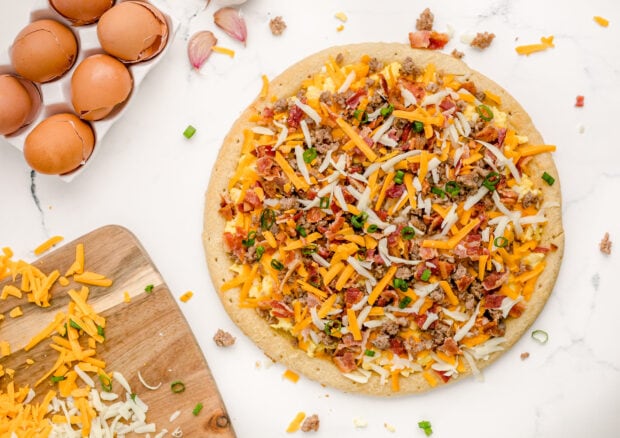 Breakfast pizza on countertop