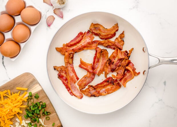 Cooked bacon in skillet