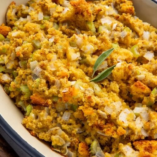 Cornbread stuffing in a large blue casserole dish