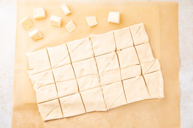 Dough for cranberry brie bites cut into rectangles