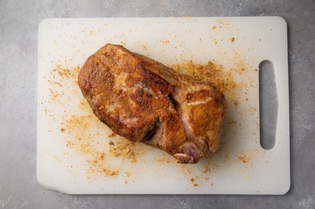 Seared pork roast on cutting board