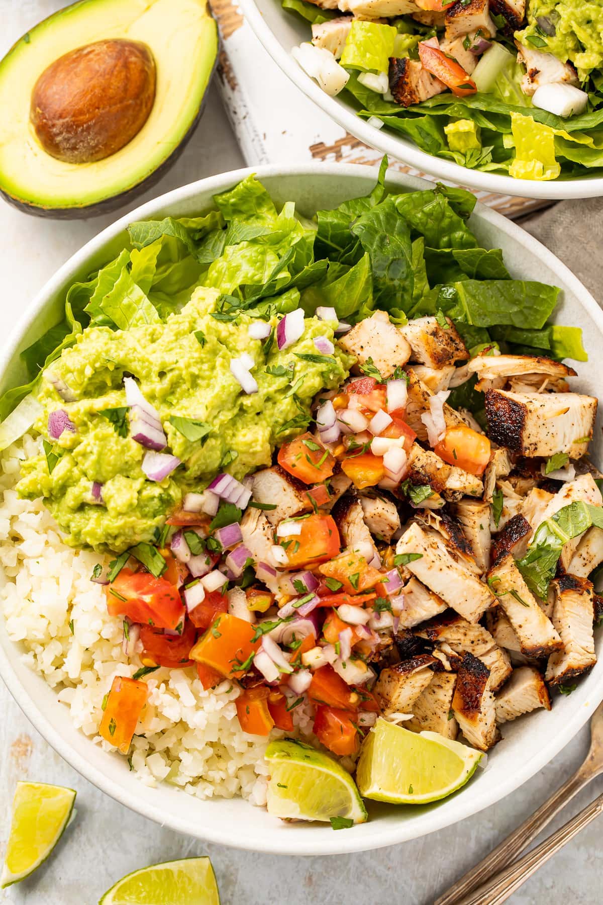 Overhead view of Whole30 chicken burrito bowls