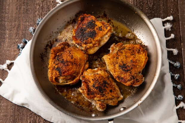 Chicken thighs in large skillet