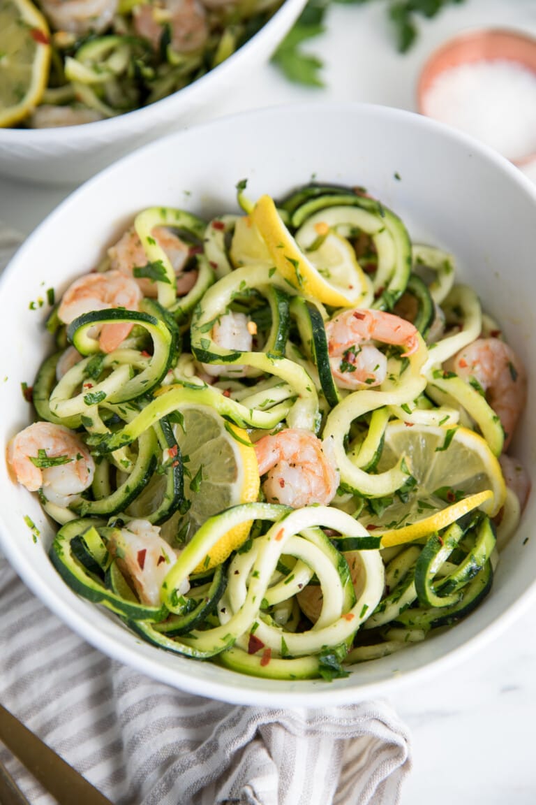 Shrimp scampi with zoodles in a white bowl