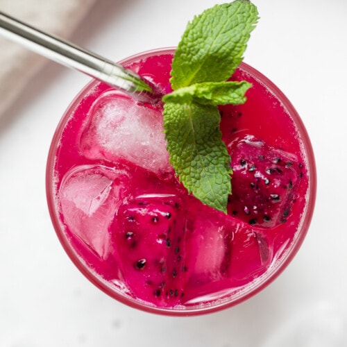 overhead image of a glass of mango dragon fruit refresher