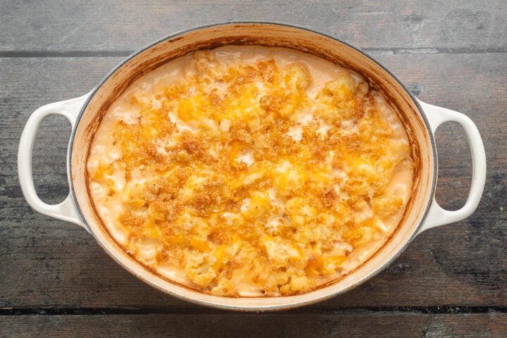 Overhead view of keto mac and cheese with golden brown "breadcrumb" topping in a large baking dish.