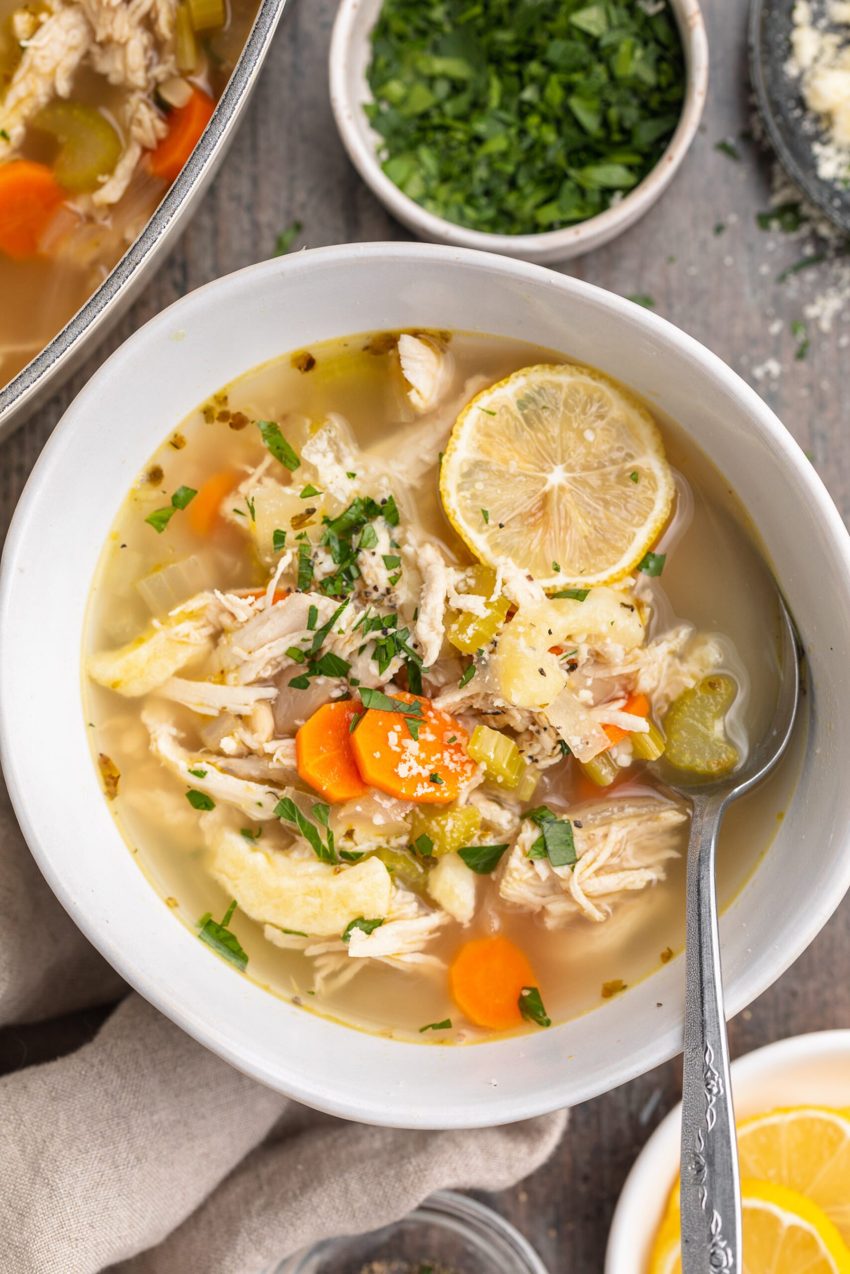 Top-down view of a bowl of keto chicken noodle soup.