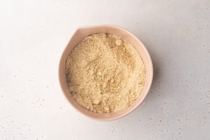 Dry ingredients for keto taco tortillas in a large mixing bowl.