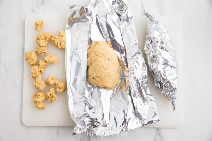 Seitan wrapped in aluminum foil.