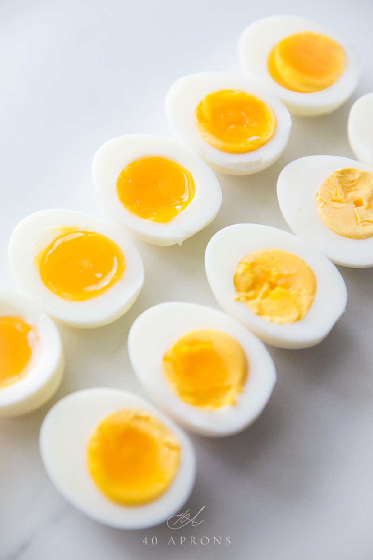 Hard and soft boiled eggs cut in half..