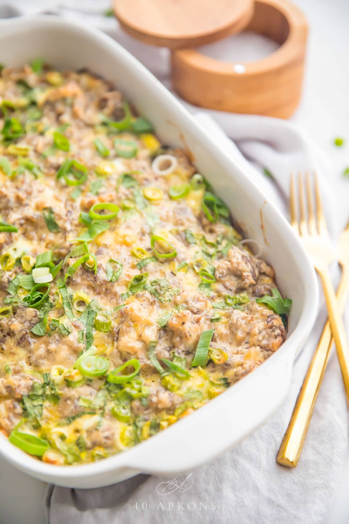 Whole30 sausage, egg, and hashbrown breakfast casserole in a casserole dish.