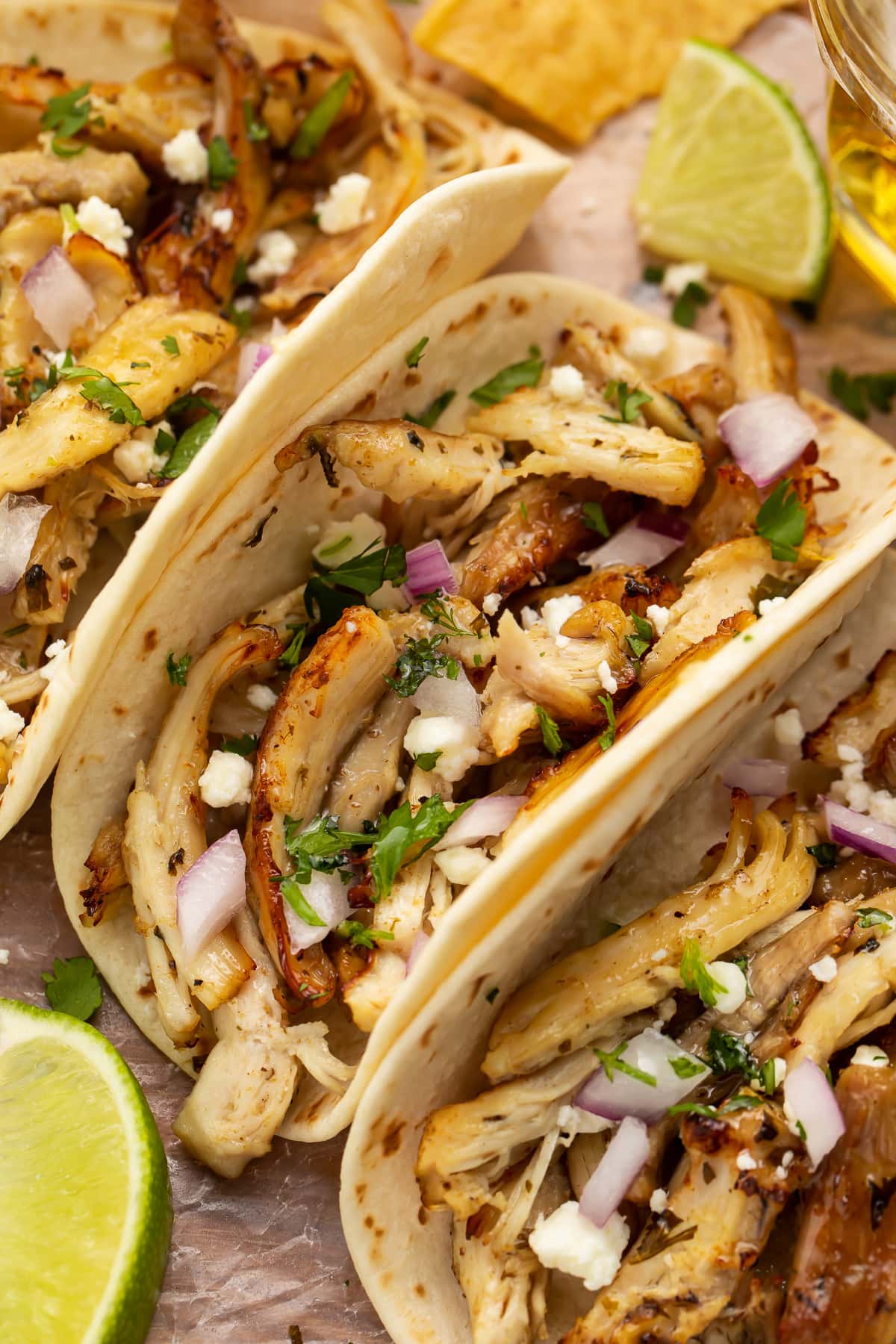 Close-up of a chicken carnitas taco with Instant Pot chicken carnitas.