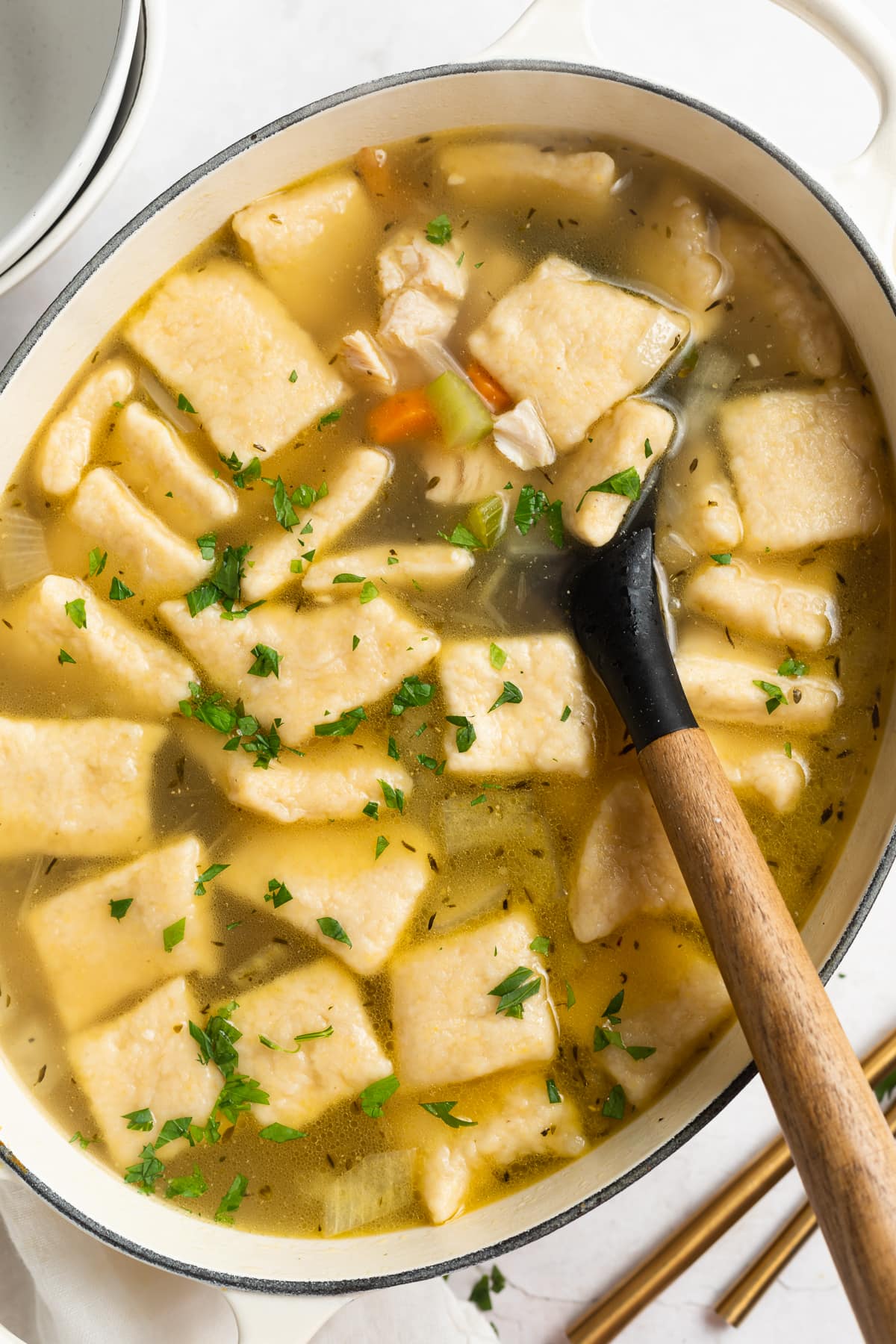 leftover turkey and dumplings on a dutch oven.