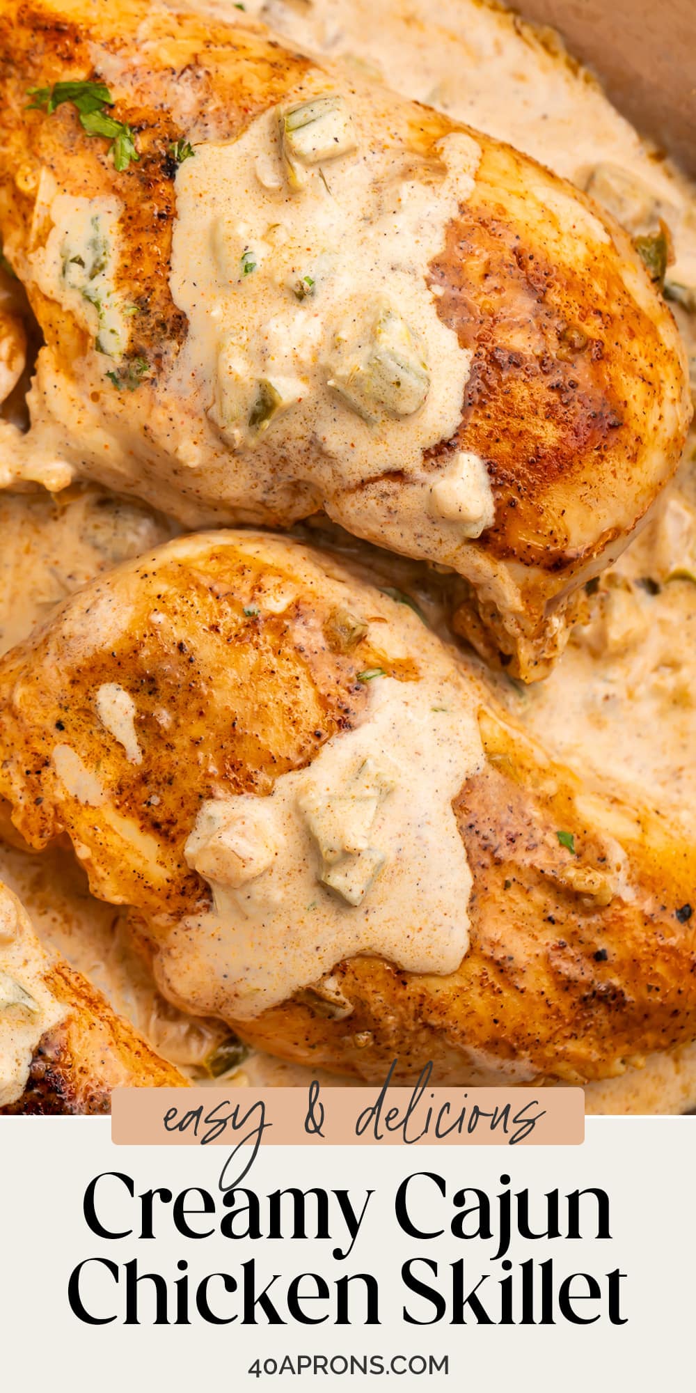 Pin graphic for creamy Cajun chicken skillet.